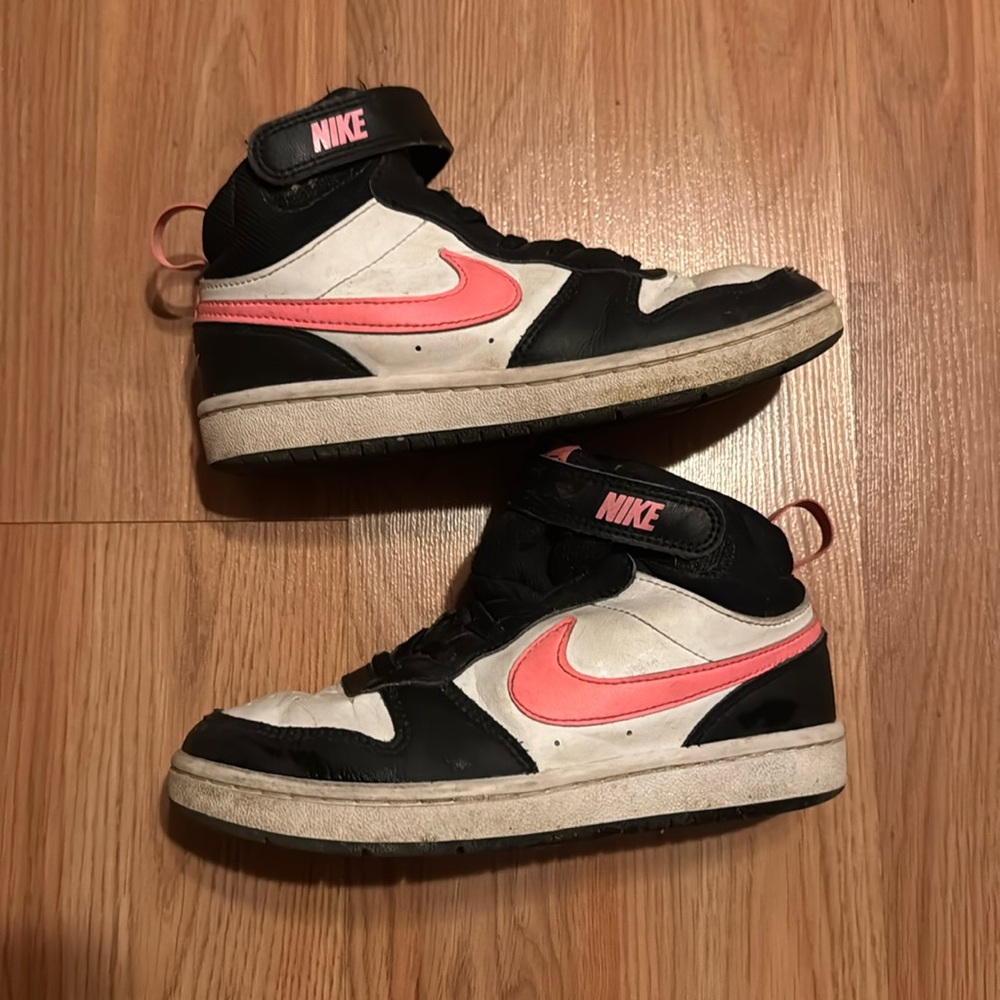 Kids Black and Pink Nike basketball shoes